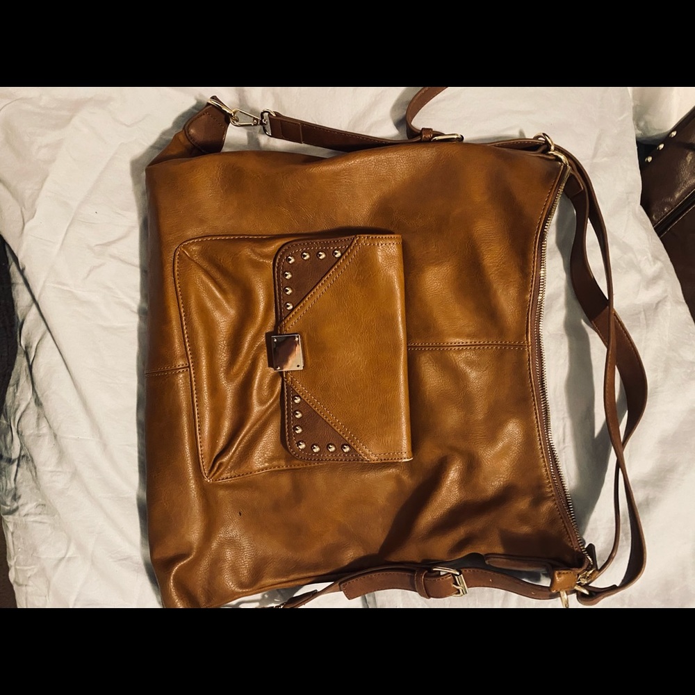 Concealed brown leather woman’s large bag